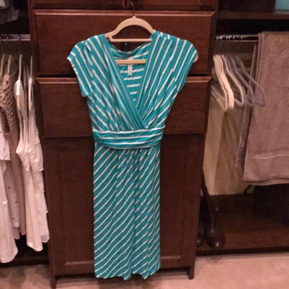 Green/white striped dress with ties in back.